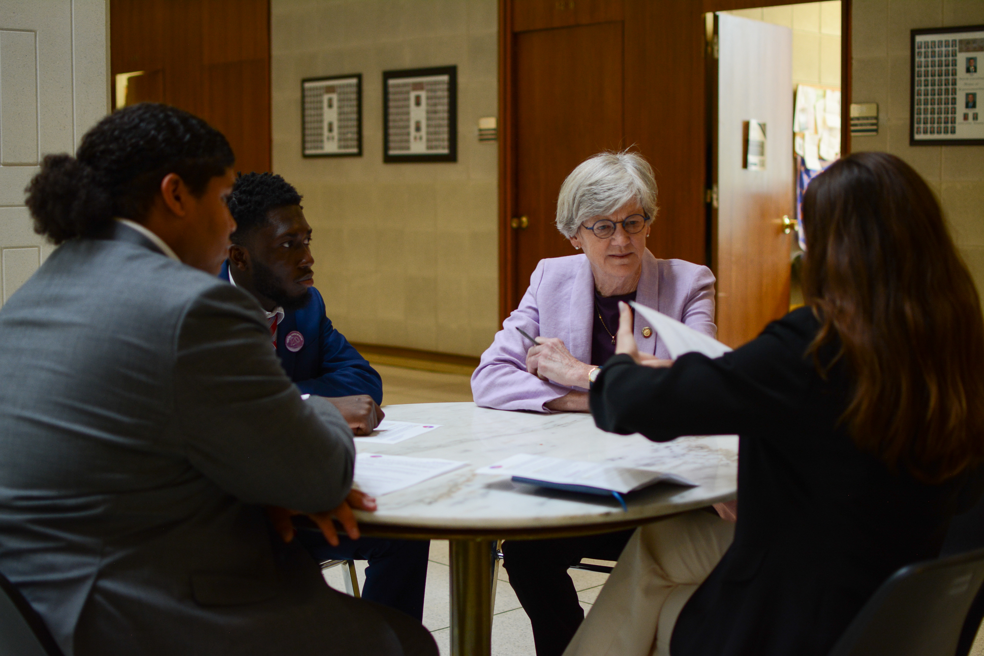 YPA members meeting with legislators in government building